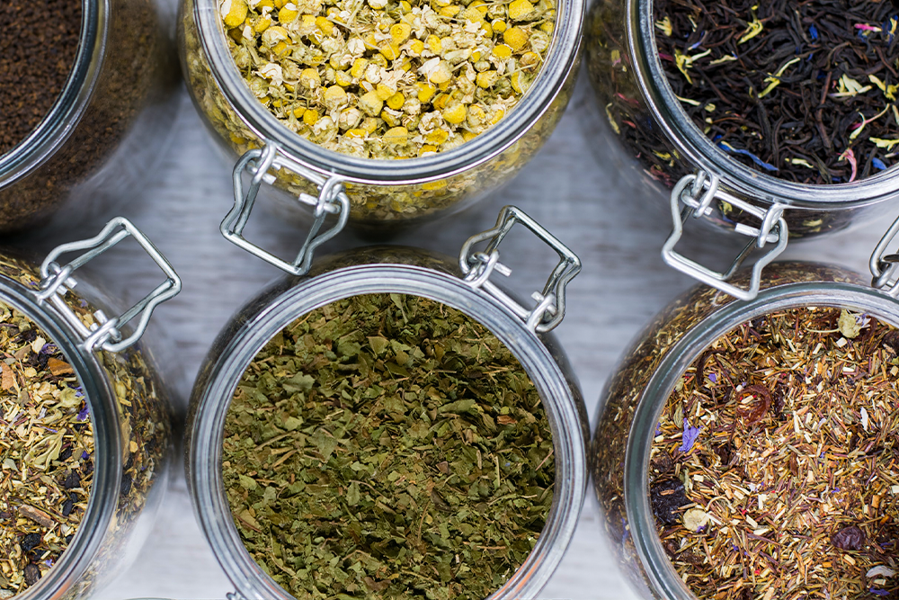 An array of herbal teas for personal wellness, including chamomile, ginger, and kratom teas.