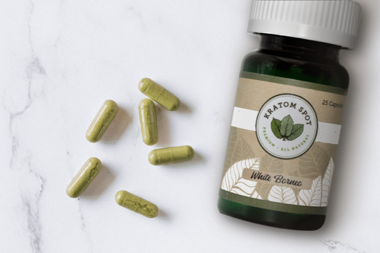Some kratom supplements sprawled out on a table.