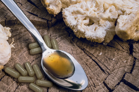 Kratom capsules next to lion's mane and other kratom alternatives